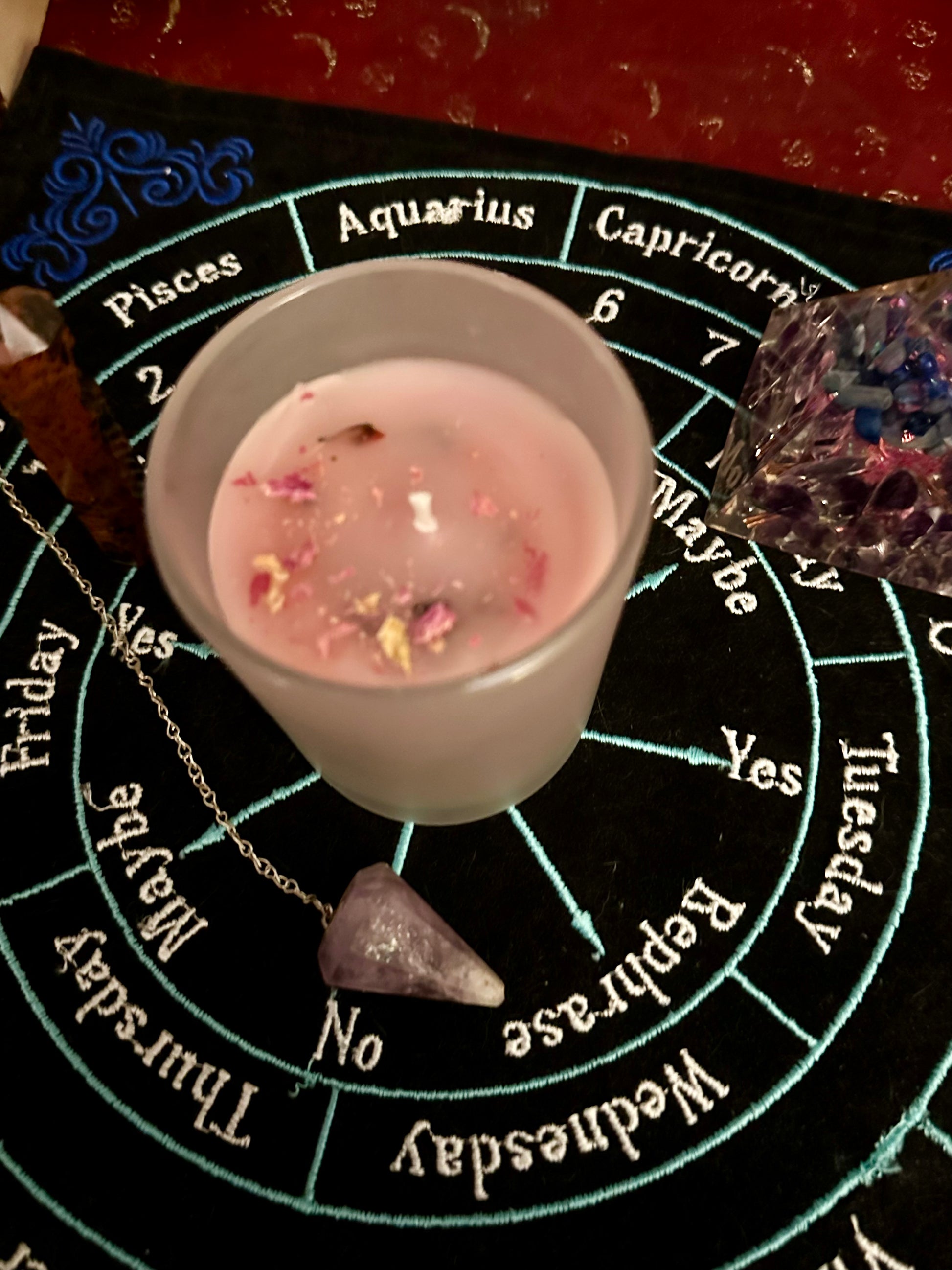 Beeswax ritual candles with herbs and crystals