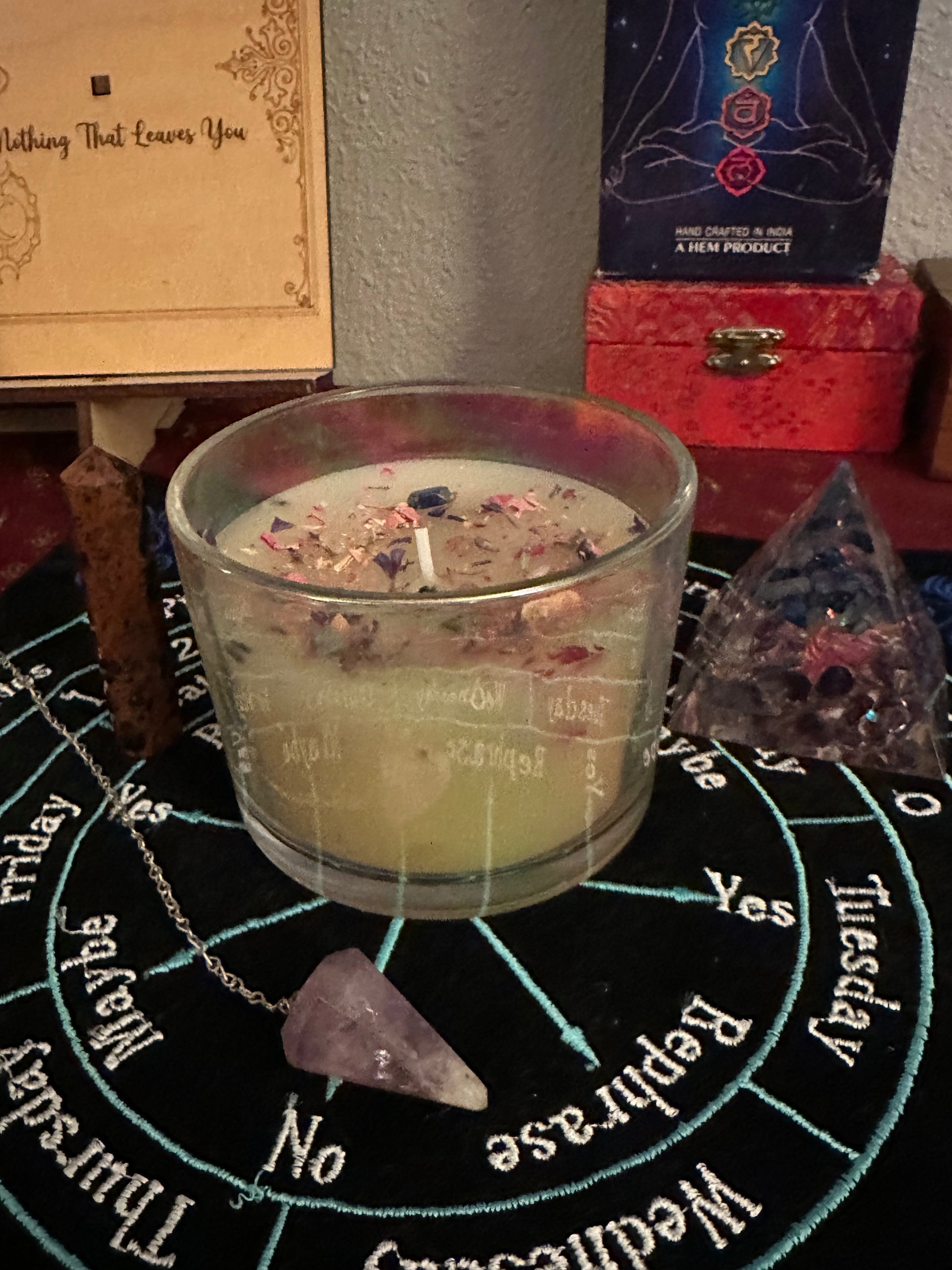 Beeswax ritual candles with herbs and crystals
