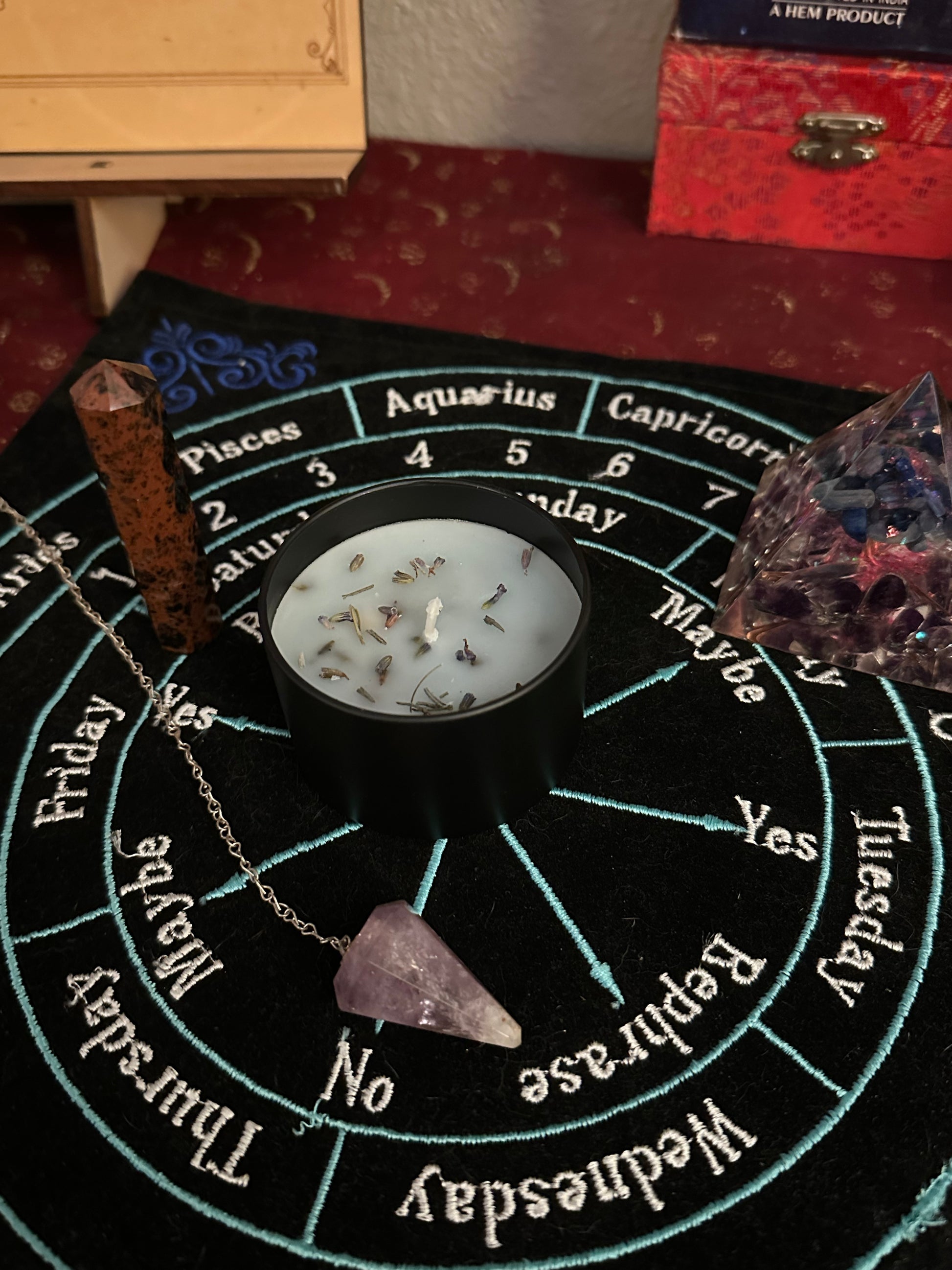 Beeswax ritual candles with herbs and crystals